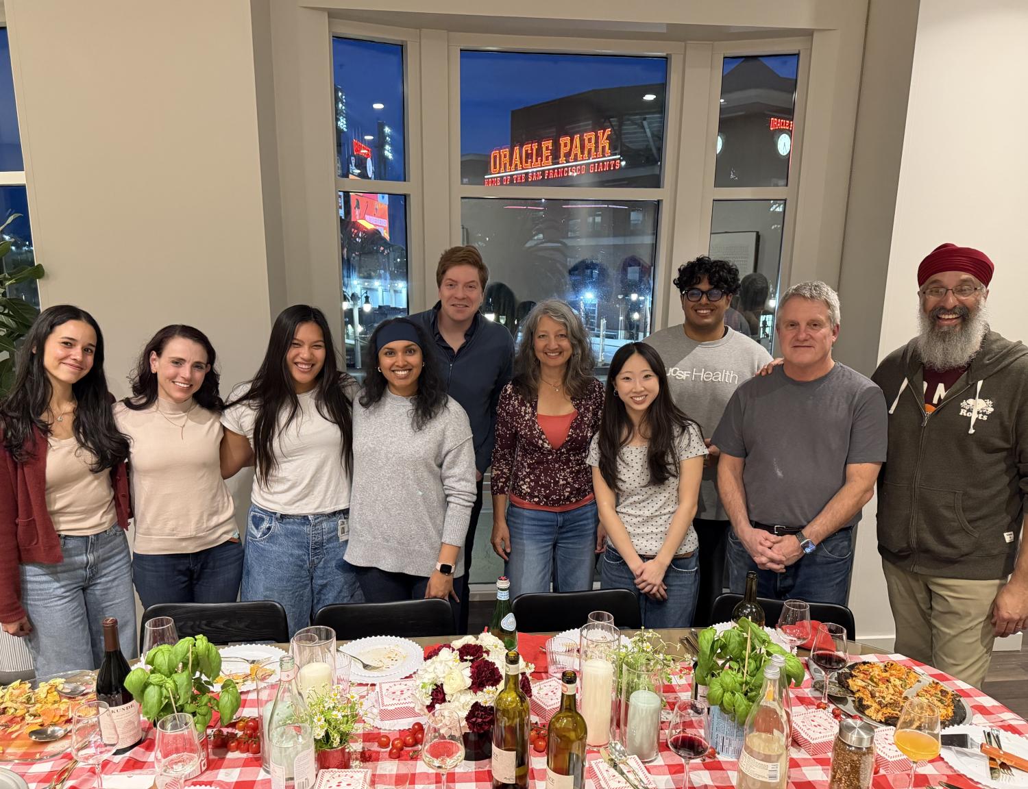 The Team Gathering to Celebrate the New Year with a Pizza Party